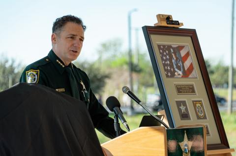 Sheriff Dennis Lemma speaks during the dedication ceremony.
