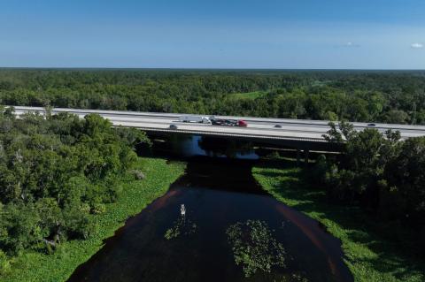An aerial photo shows the new Wekiva Parkway where it crosses over the Wekiva River. 