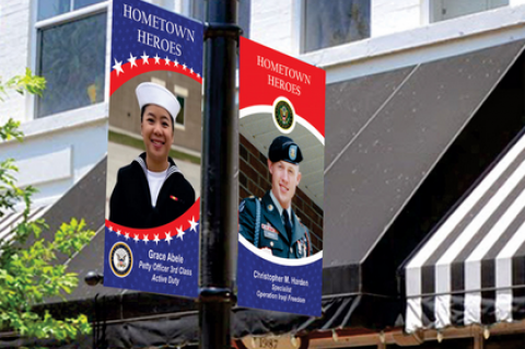 Celebrating Heroes honors living and deceased service members by placing high quality, full color banners featuring the image, name, rank and awards.