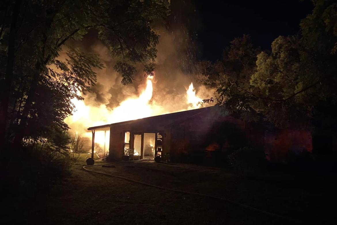 The Casselberry home on Center Drive was engulfed in flames when firefighters arrived.